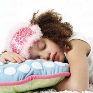 Young Girl Asleep on Pillow